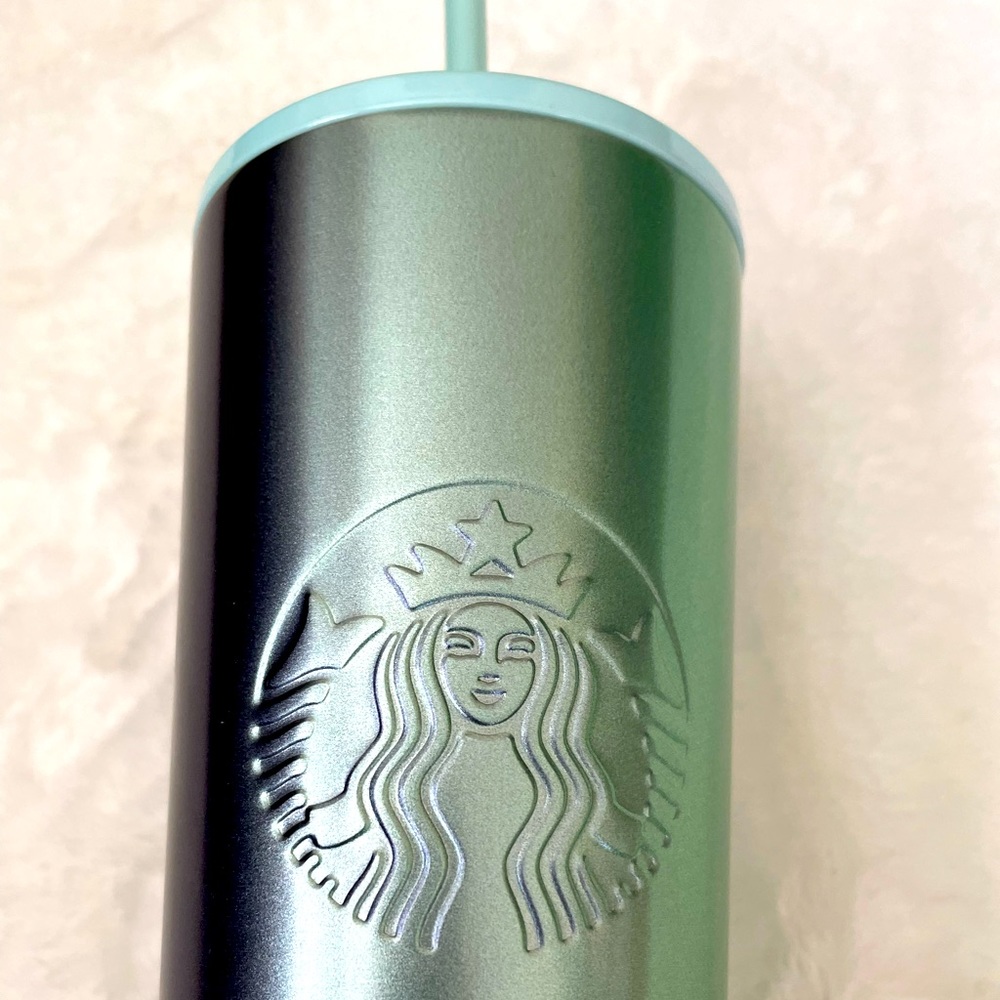 Starbucks holding season cup